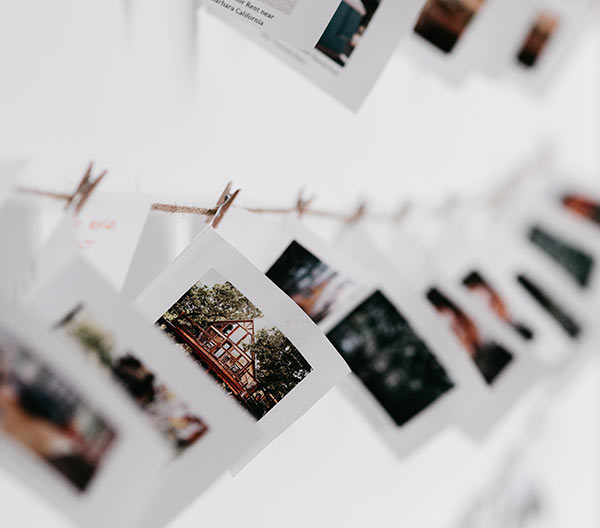 Unique vacation rentals decorate the walls of the Glamping Hub office.