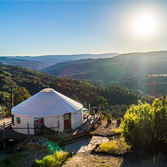 Book a weekend getaway with Glamping Hub and stay in a yurt camping rental.